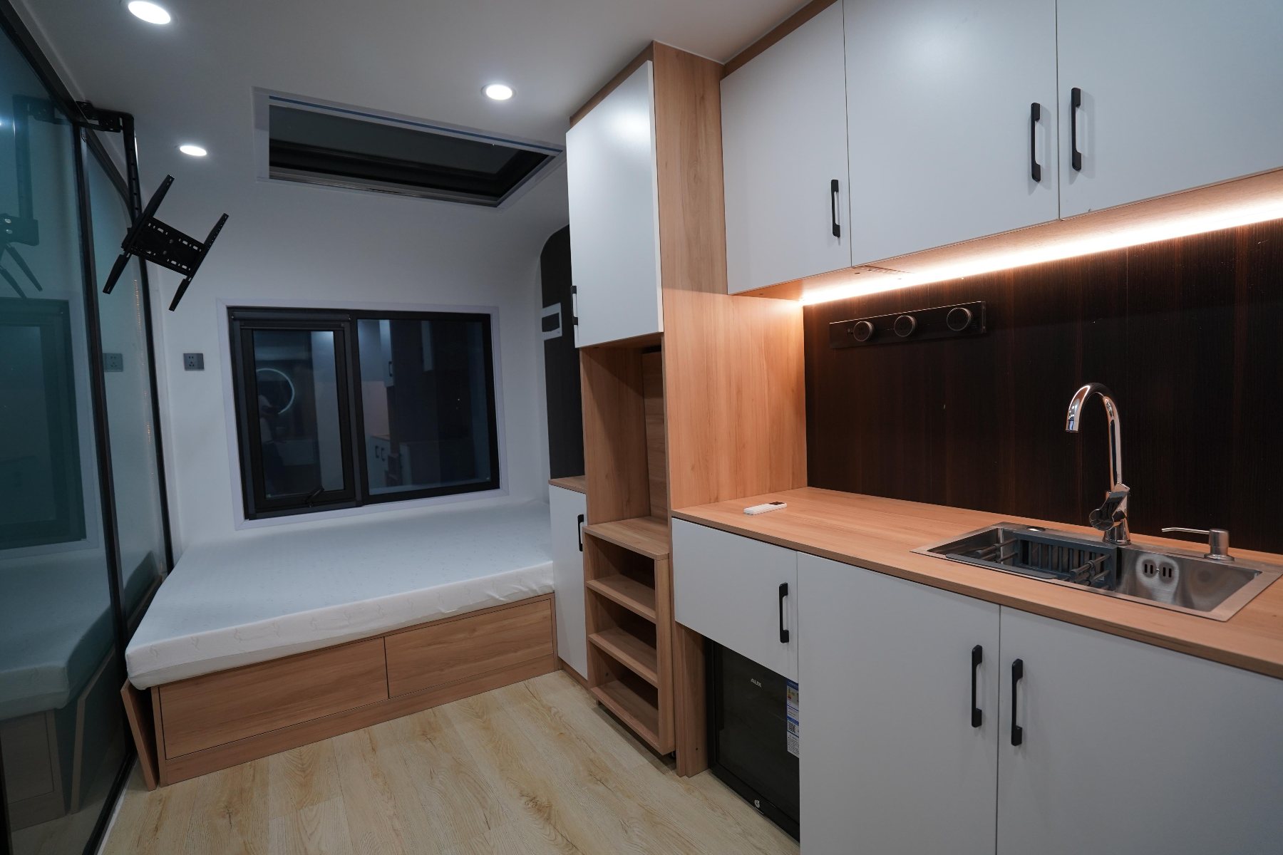 Interior: bedroom and kitchen